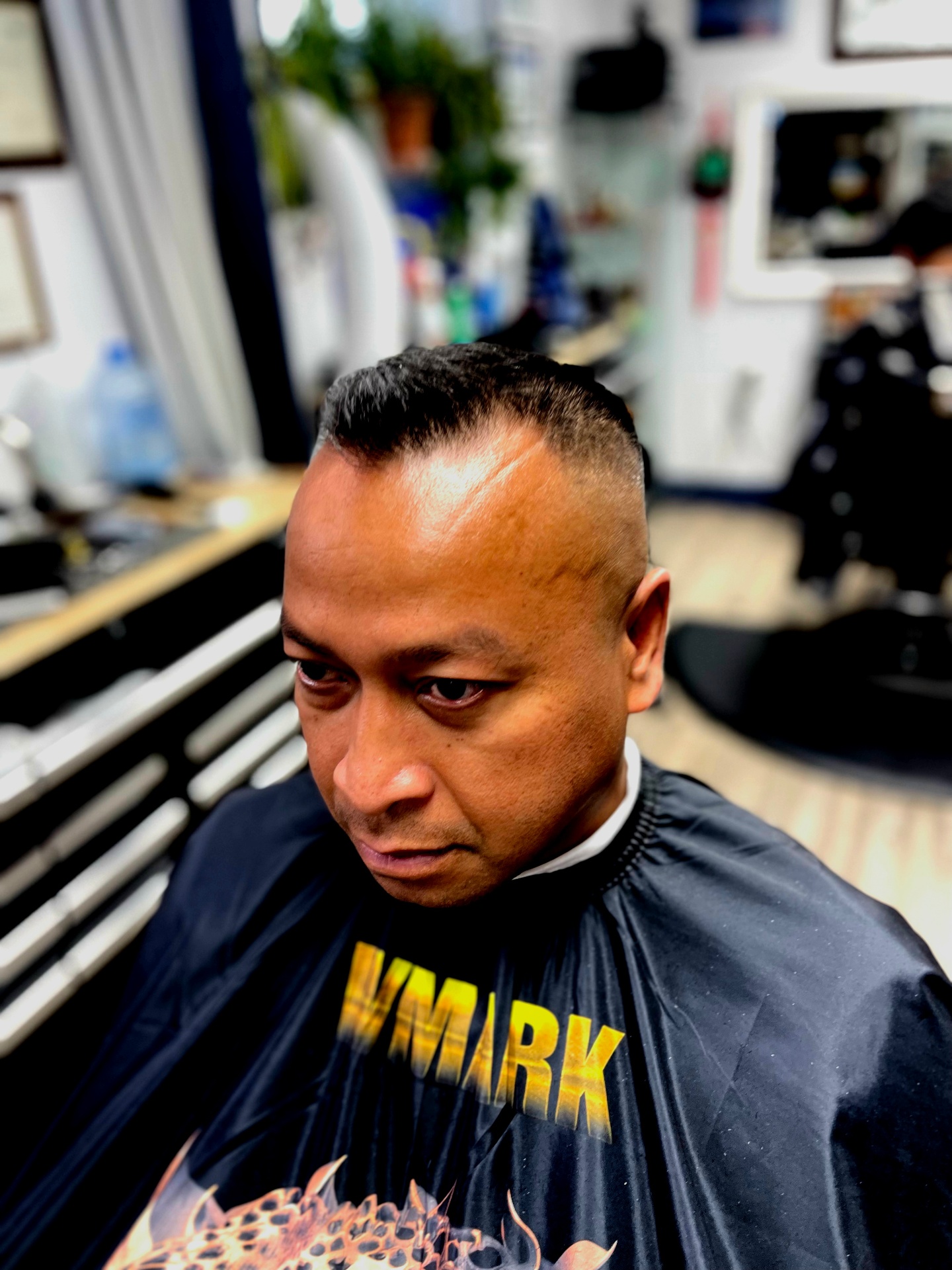 Finished high fade with a sharp hard part